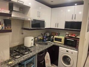 Private kitchen - Cozy & Fully Furnished 1+1 Apartment for Rent in Avcılar Merkez⁠ (Istanbul)
