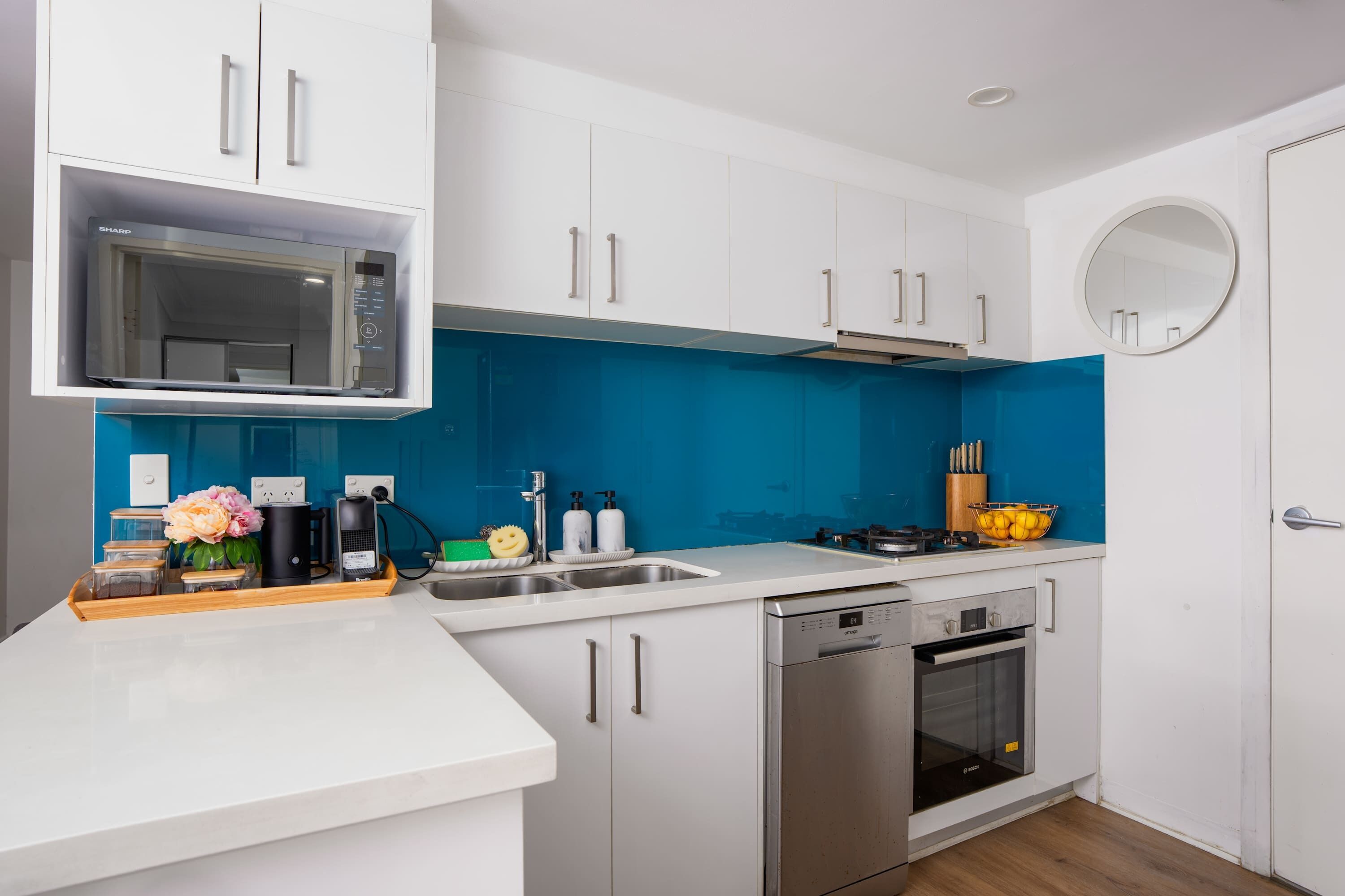 Coffee/tea maker, fridge, microwave, oven