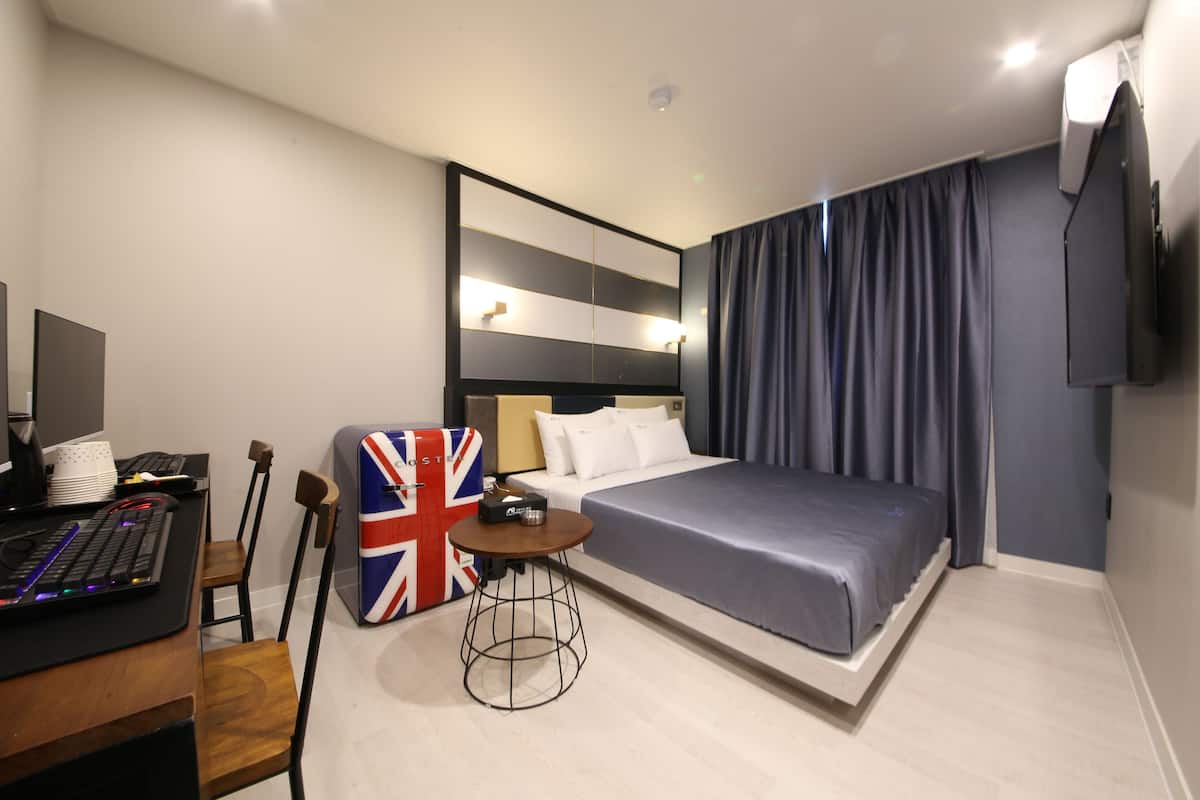 Suite Deluxe | Escritorio, espacio para trabajar con un portátil, wifi gratis