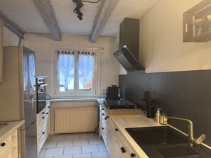 Coffee/tea maker, fridge, microwave, oven