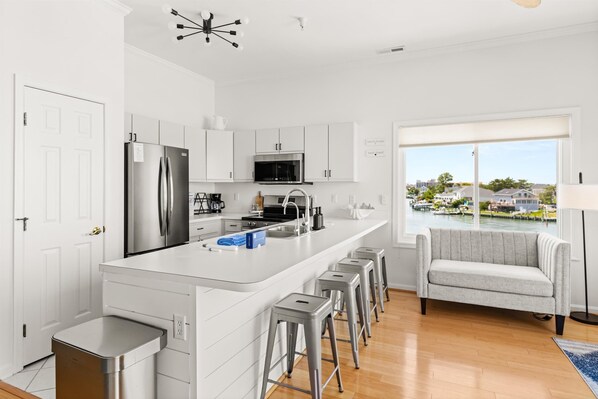 Coffee/tea maker, fridge, microwave, oven - Sunsets & Bay Views | Pool + Fishtails Rentals (Ocean City)