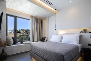 A modern bedroom with a large bed, a window with a view, and a bedside table. - Maple Villa 1 Deluxe Sea View Villa in Walking Distance From Beach (Agios Vasileios)