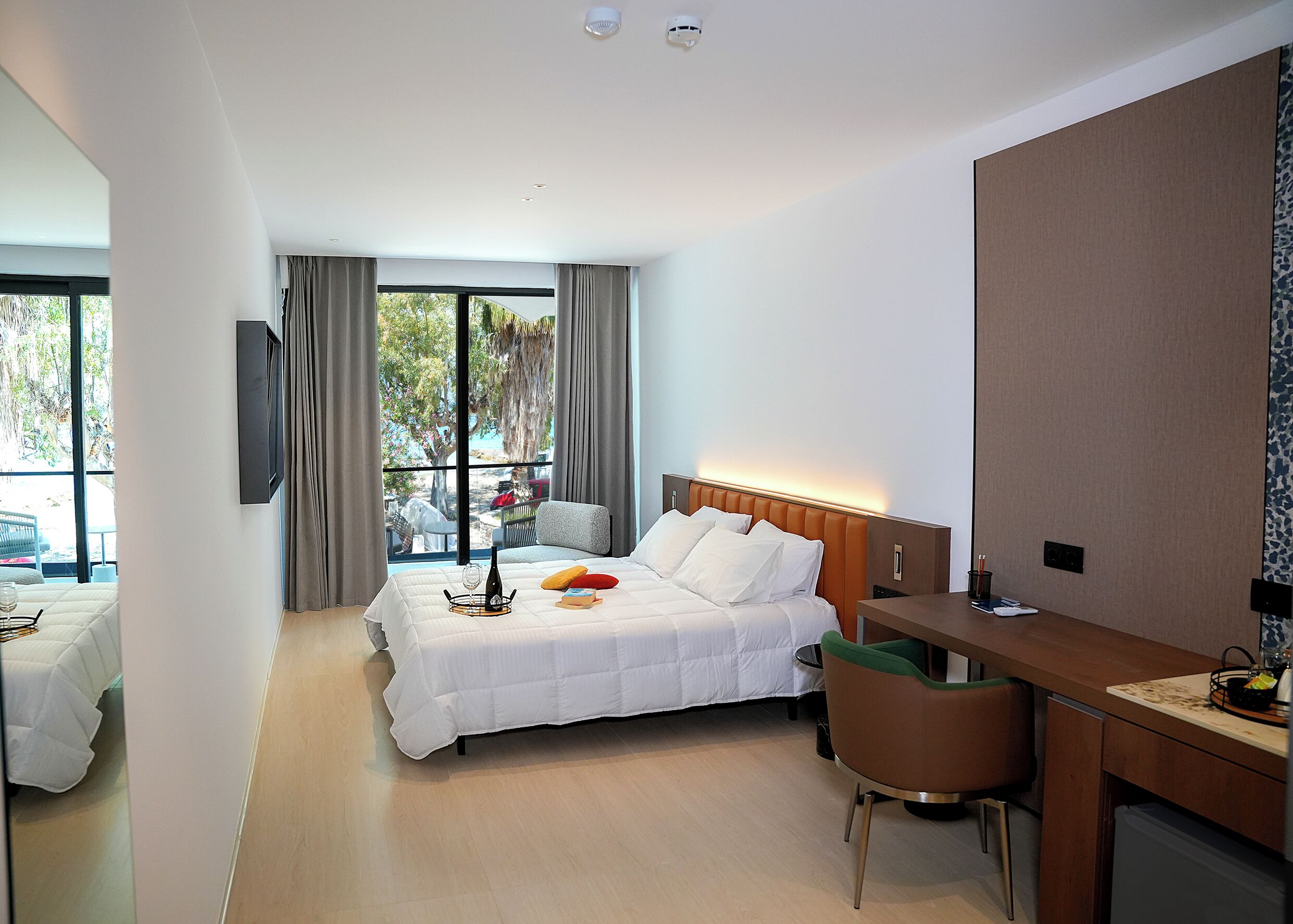 Chambre Deluxe, vue sur la mer | Bureau, espace de travail pour ordinateurs portables