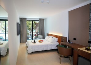 Deluxe Room, Sea View | Desk, laptop workspace, iron/ironing board, free cots/infant beds