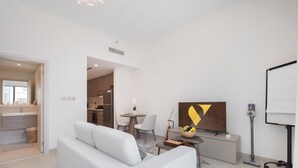 Estudio Deluxe, balcón, vistas a la ciudad | Zona de estar