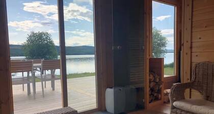 Lakefront house with a sauna, private dock, and rowboat