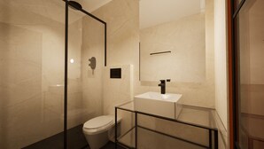 Une salle de bain moderne avec une douche à parois de verre, un lavabo blanc et des toilettes.