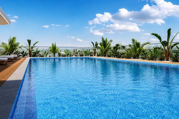 Outdoor pool - HAVN- New Spacious 1 Bedroom in JVC (Dubai)