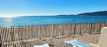 Two-bedroom apartment on the beach, right on the water, near shops