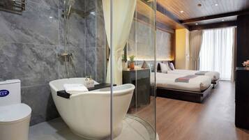 Habitación Deluxe, 2 camas dobles, vistas al valle | Baño | Ducha, secador de pelo, toallas y jabón