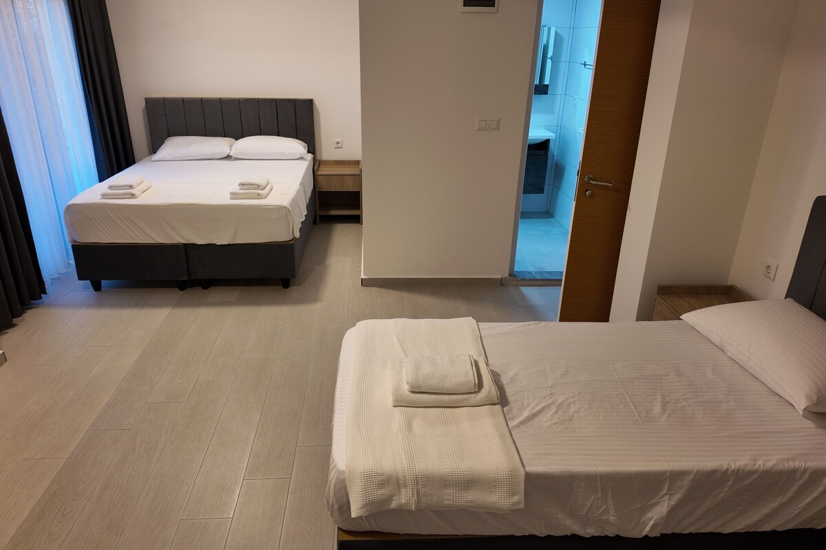 Family Quadruple Room, Balcony, Garden View | Laptop workspace, blackout drapes, soundproofing, WiFi (free)