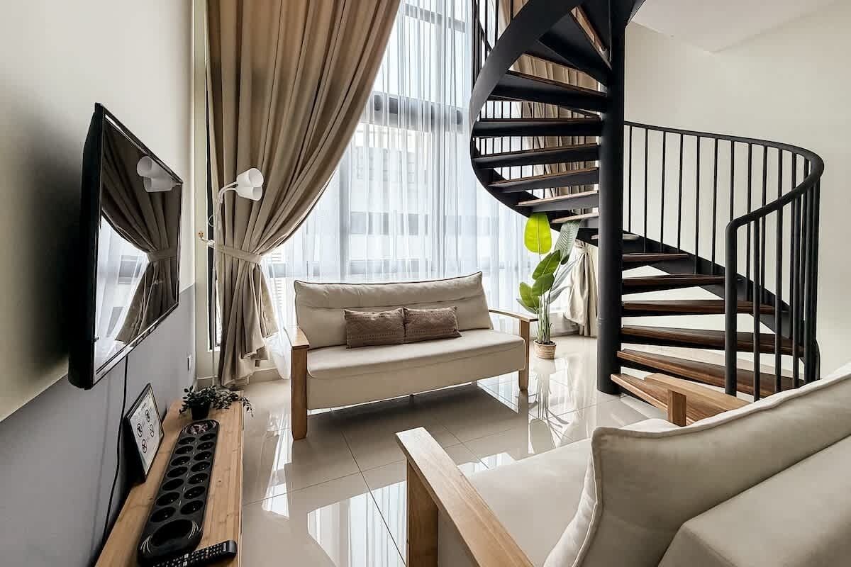 A modern duplex with a spiral staircase.