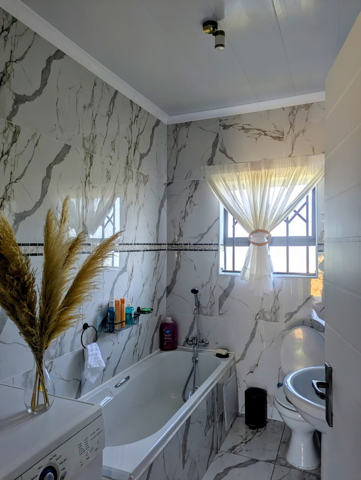 Jetted bath, hair dryer, towels, soap