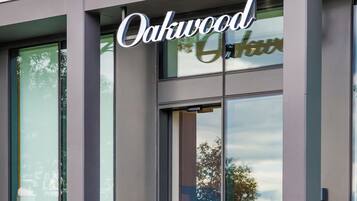 A building with the name 'Oakwood' prominently displayed on the facade.