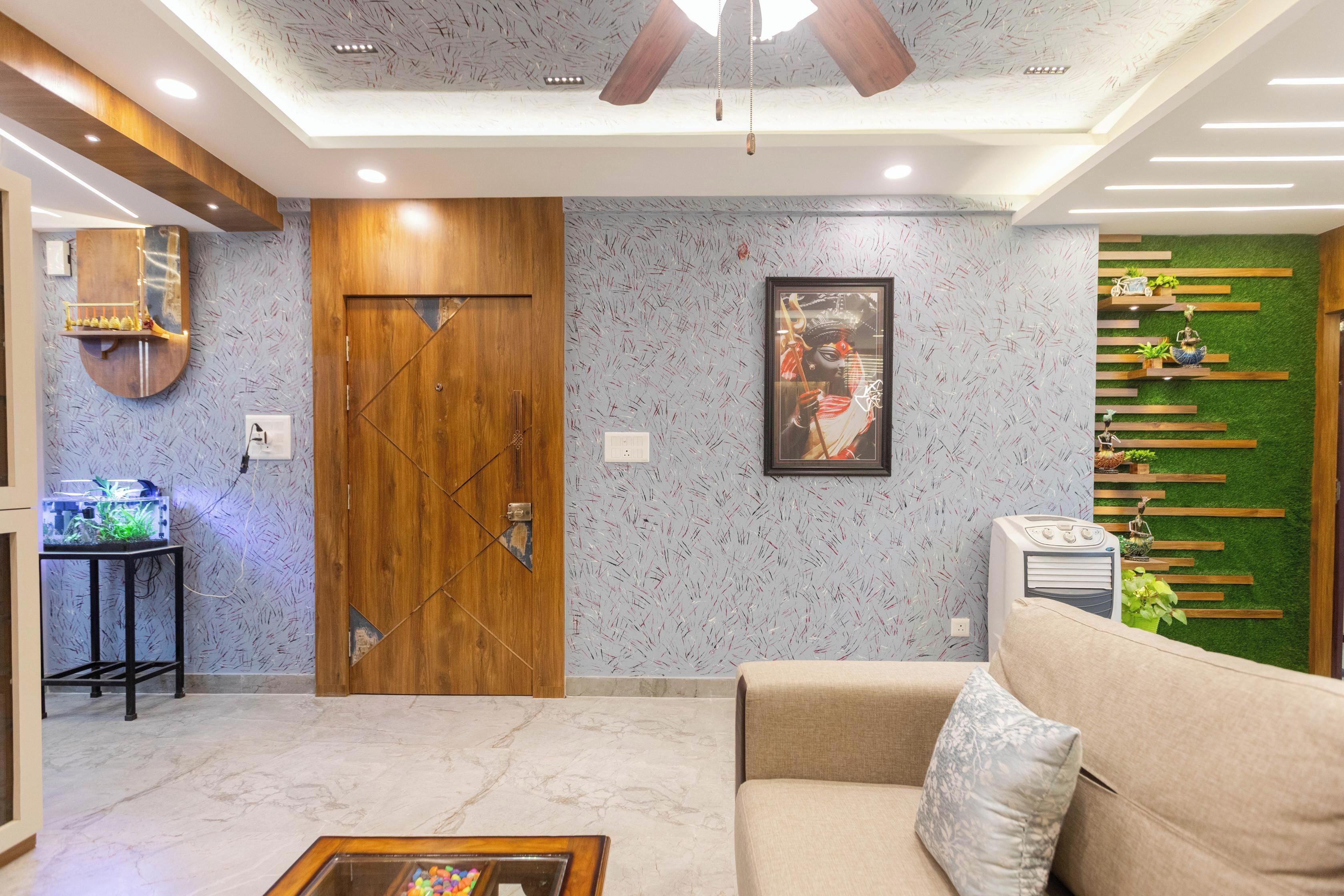 Una sala de estar moderna con puerta de madera, sofá, mesa de centro y aire acondicionado instalado en la pared.