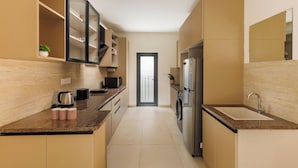 Apartment (1 Bedroom) | Private kitchen - Aero Rosewood by Red Olive 3bhk 5min Airport (Bengaluru)
