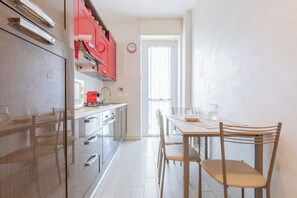 Departamento | Cocina privada | Cafetera de espresso y tetera eléctrica 