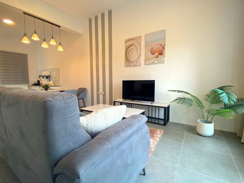 Spacious 3-bedroom neighborhood apartment with AC in Langkawi
