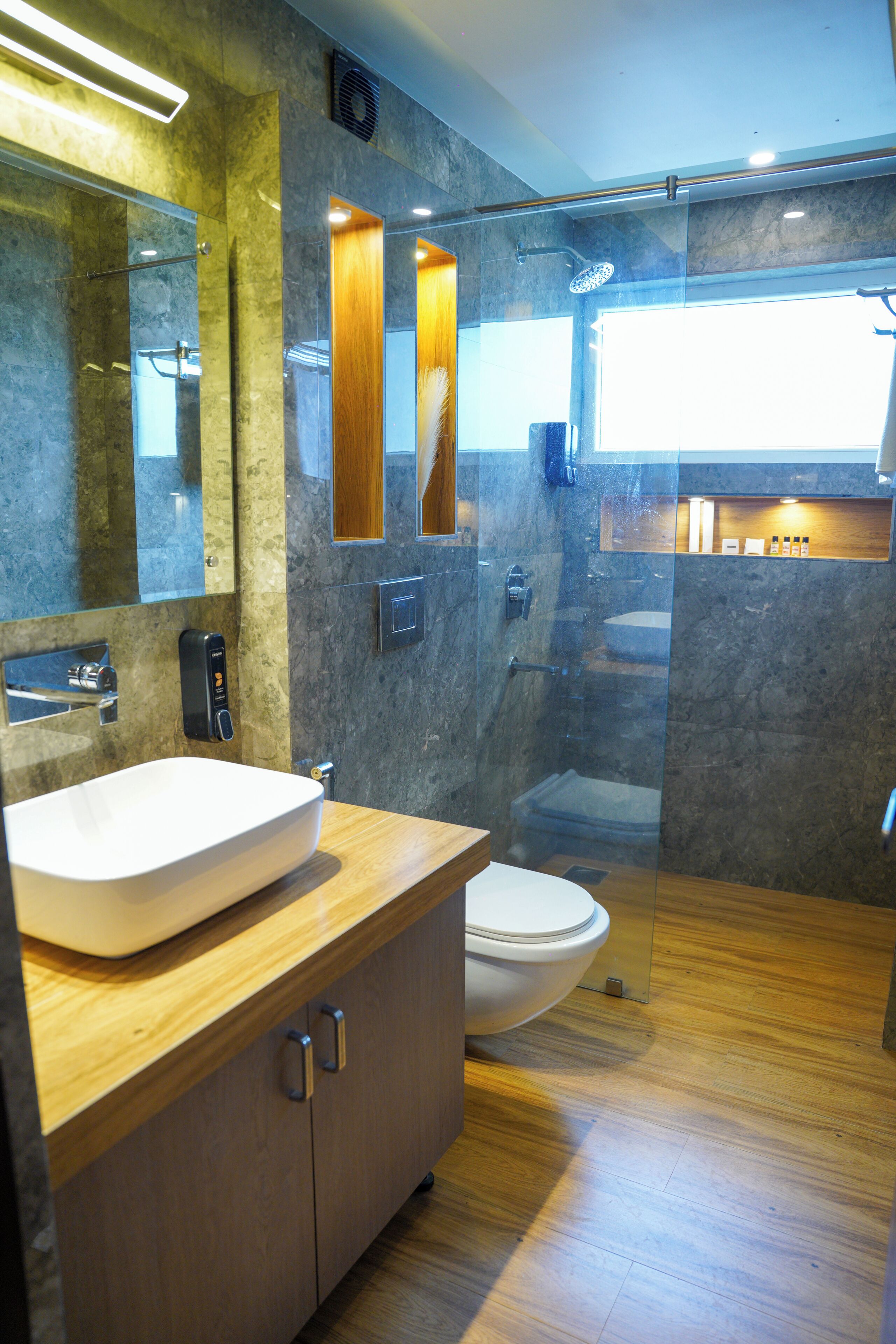 Shower, hair dryer, slippers, towels