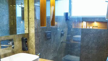 Shower, hair dryer, slippers, towels
