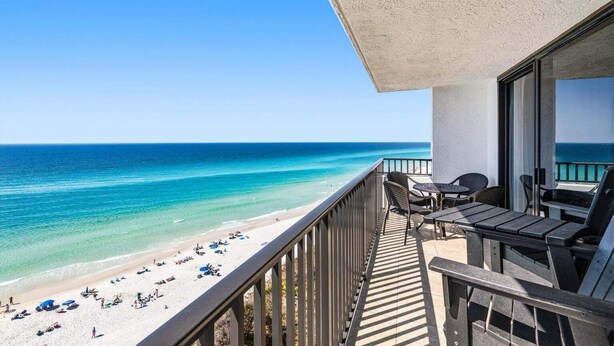 A balcony with a view of a beach and ocean. - Seagrove Sunrise 1004-Beachfront Views-Sleeps 6 (Seagrove Beach)