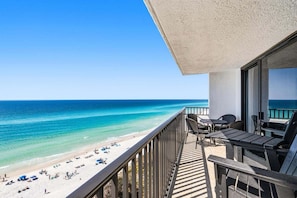 A balcony with a view of a beach and ocean. - Seagrove Sunrise 1004-Beachfront Views-Sleeps 6 (Seagrove Beach)