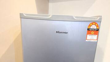 A Hisense refrigerator with an energy efficiency label.