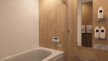 Duplex, 2 Bedrooms, Balcony | Bathroom | Hair dryer, slippers, bidet, towels