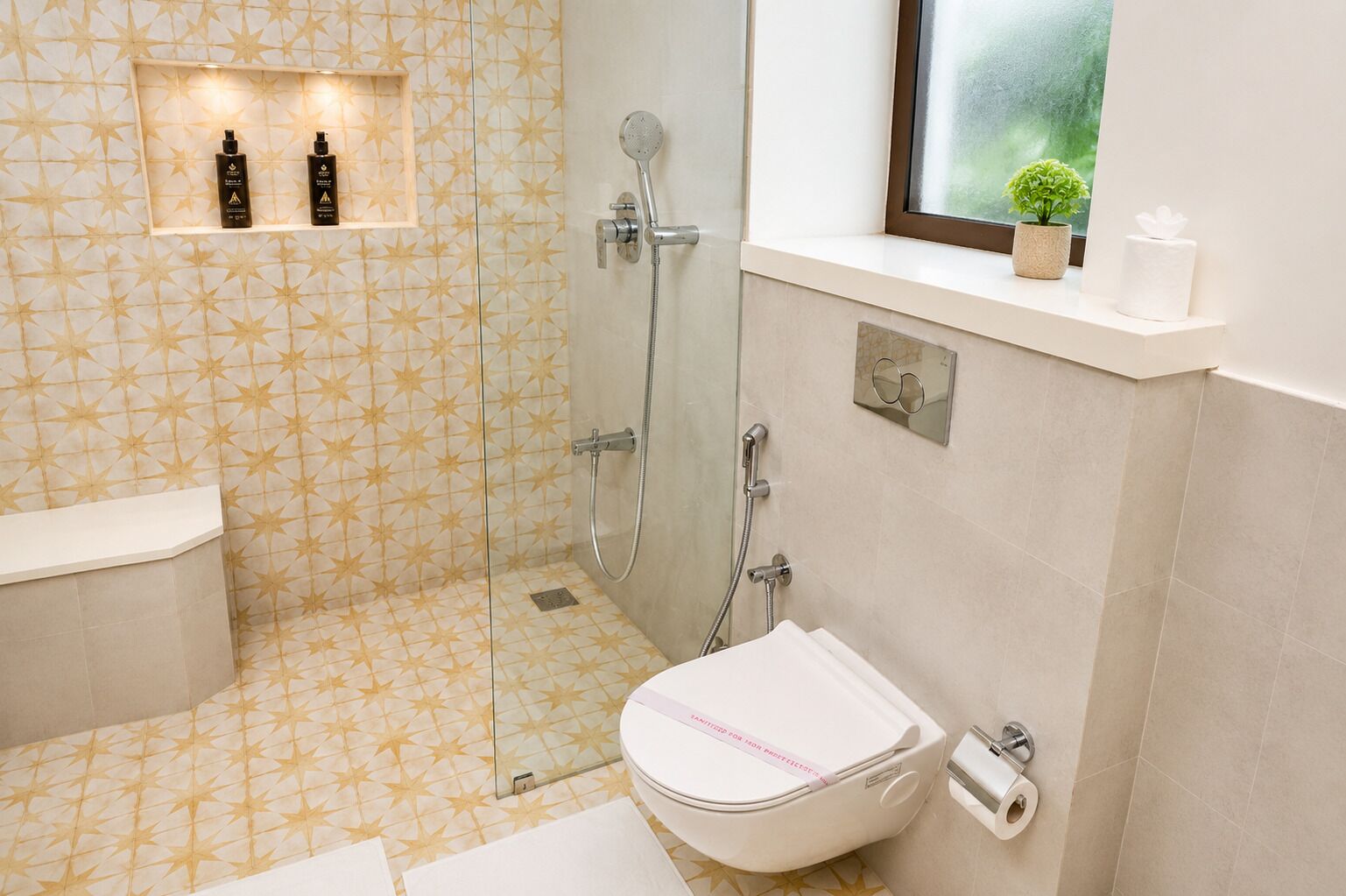 A bathroom with a shower, toilet, and a shelf with toiletries.