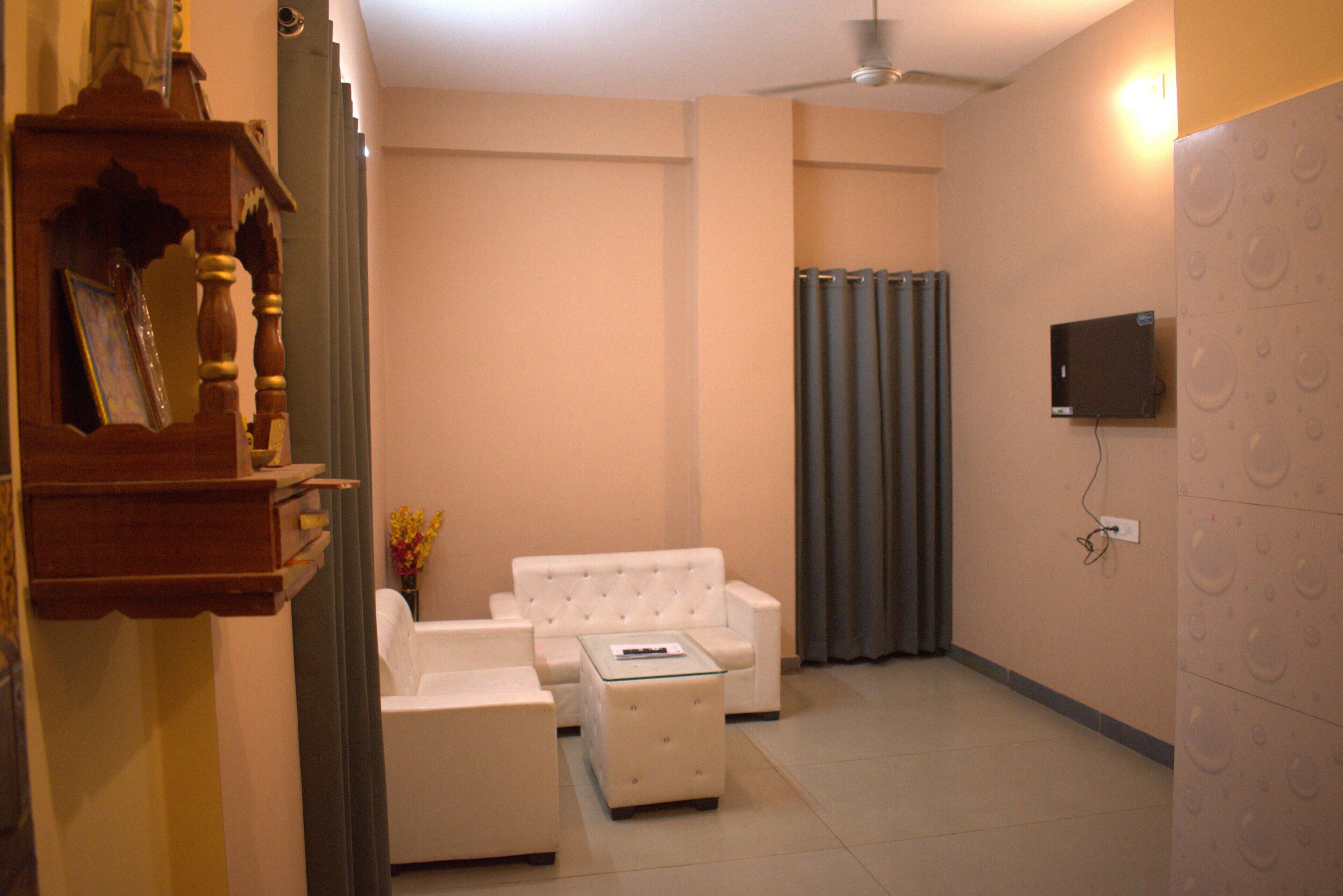 Deluxe Room, City View | Ruang tamu