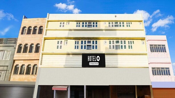 A hotel with a sign reading 'HOTEL' and a company-serviced logo. - Classic Sindhi Camp Paul Avenue (Jaipur)