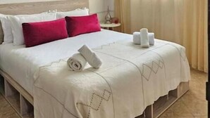 1 dormitorio, tabla de planchar con plancha, wifi gratis y ropa de cama