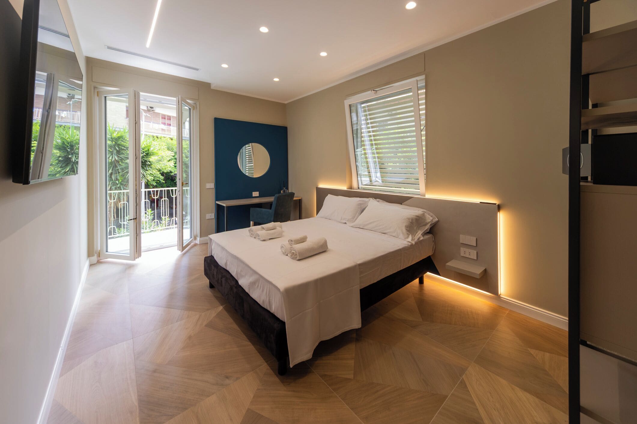 Luxury Apartment, Balcony, City View | Pillow-top beds, in-room safe, blackout curtains, iron/ironing board