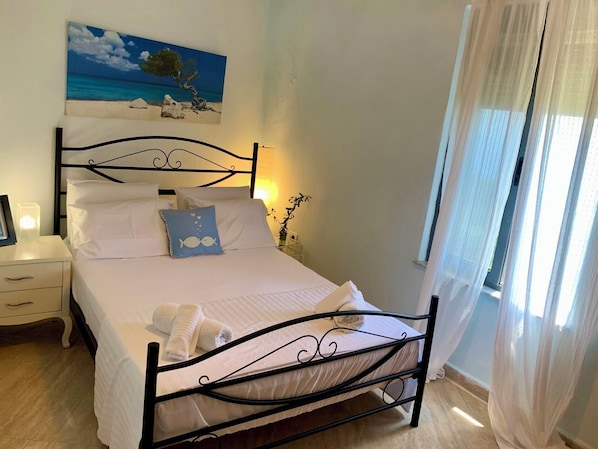 2 habitaciones, tabla de planchar con plancha, wifi y ropa de cama 