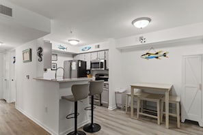 Dining - Bright, coastal-chic 2BR/2BA retreat mins from the beach! Features a fully stocked kitchen, plush queen bed, cozy second bedroom, and 2 full baths. Enjoy access to the community pool and fitness center. Near Destin Harbor, shopping, and dining! (Destin)