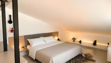 Tabla de planchar con plancha, wifi y ropa de cama