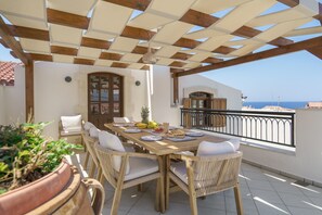 Villa | Outdoor dining - Kamares Villa, a 1912 Stonebuilt Estate With Heated Pool! (Mylopotamos)