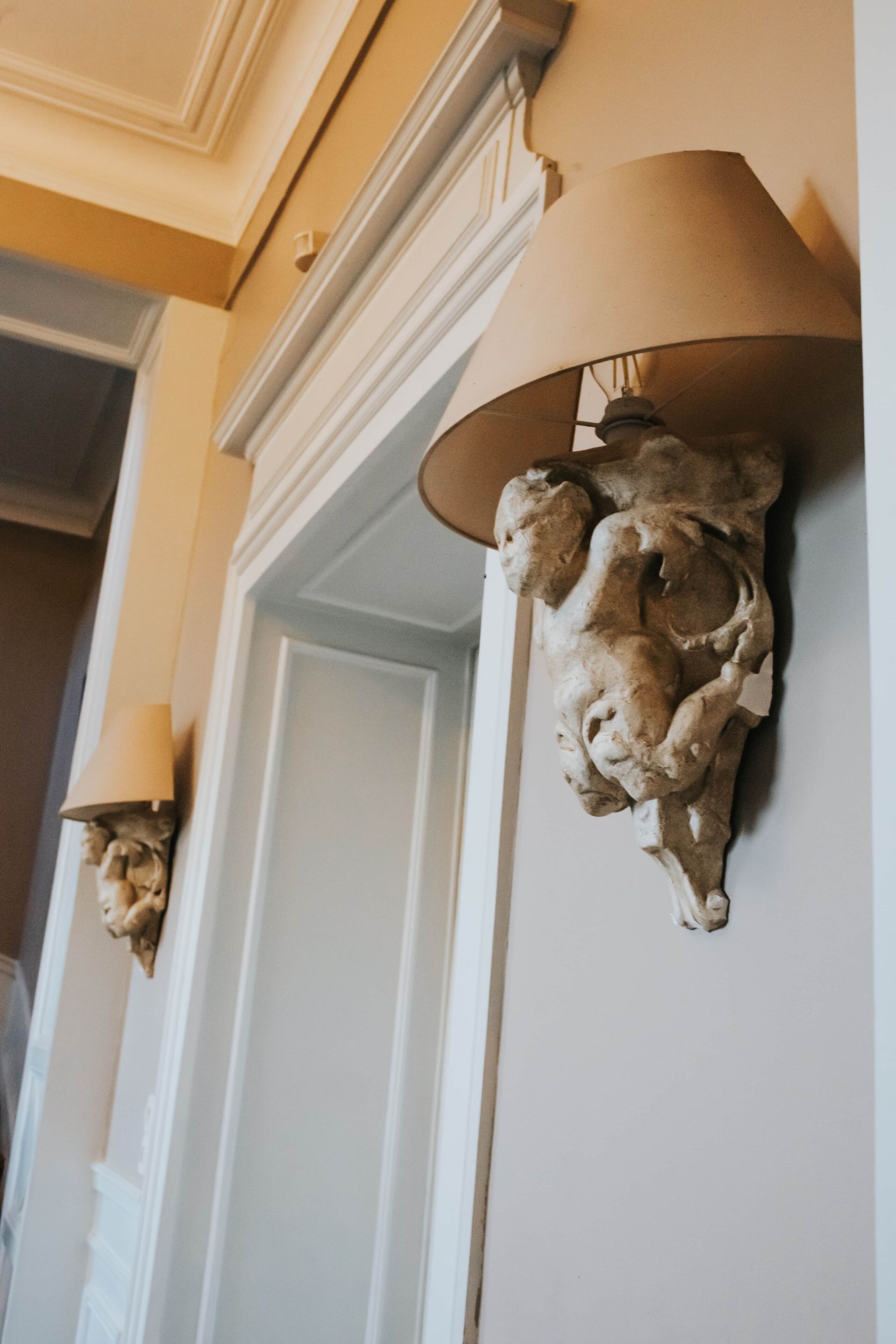 Wall-mounted sconces with a unique, textured design.