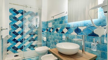 Triple Room, Courtyard View | Bathroom | Shower, hair dryer, towels, soap