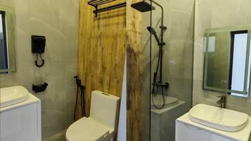 Shower, hair dryer, towels, soap