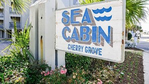 A sign for Sea Cabin in Cherry Grove.