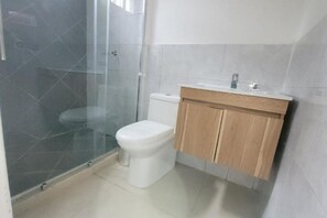 Shower, towels, soap, toilet paper