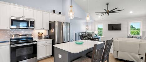 Coffee/tea maker, fridge, microwave, oven