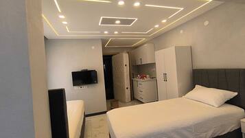 Luxury Room, Multiple Beds, Balcony, Garden View | Desk, laptop workspace, free WiFi