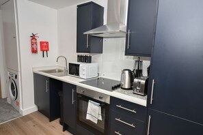 Fridge, microwave, oven, stovetop - Modern 2 Bedroom Apartment in Central Bradford (West Yorkshire)
