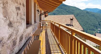 Apartment 'Maso Bornie Fior Di Melo' mit Bergblick, Gemeinschaftsterrasse und WLAN