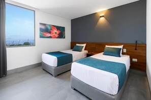 Standaard Twin kamer | Een kluis op de kamer, een bureau, geluiddichte muren, gratis wifi