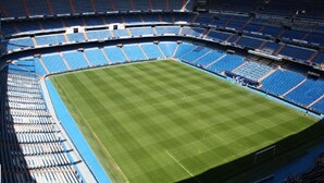 A stadium with tiered seating and a central field. - 8-guest Malasana Central Suite (Madrid)