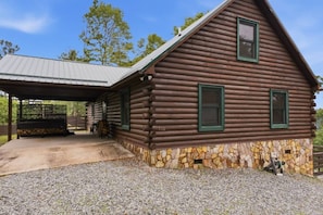 A log cabin with a stone foundation, a covered porch, and a metal roof. - Hot Tub, Views, Firepit, Fireplace, Game Room (Banner Elk)