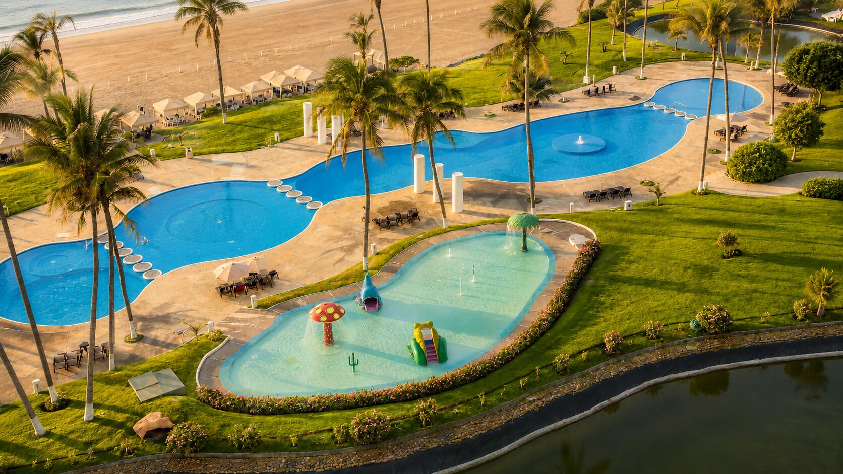 Deluxe Apartment, Balcony, Beach View | Pool | Outdoor pool